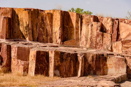 Rhyolite is an igneous volcanic rock of felsic (silica-rich) composition.  Due to  high silica content rhyolite lava is very viscous & flows slowly and tends to pile up and form lava domes.の写真素材