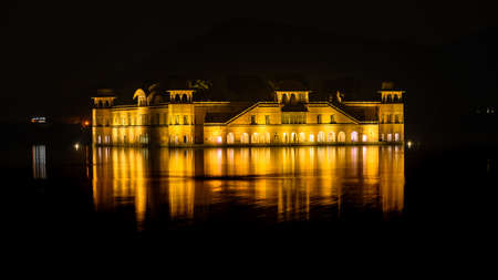 Illuminated night view of Jal Mahal 'Water Palace' is an architectural showcase of Rajput style in the Man Sagar lake in jaipur city, the capital of Rajasthan, India.のeditorial素材