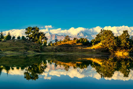 Mesmerizing view at Deoria Tal or Lake nestled in Garhwal Himalayas at  Chopta, Uttarakhand, India. This lake is a camping location for Tungnath Chandrashila hiking trail.の写真素材