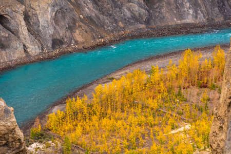 Beautiful landscape of Spiti river valley, vegetation & trees survive along water streams only due to prevailing severe cold and dry climatein Lahaul Spiti region of Himalayas in Himachal Pradesh.の写真素材