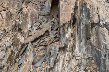 Strata of Slate is a fine-grained  homogeneous metamorphic rock derived from  shale type sedimentary rock composed of clay or volcanic ash. It is found in Himalayas in Himachal Pradesh, India.の写真素材