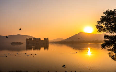 Panoramic view during Sunrise at the Jal Mahal 'Water Palace'. It is an architectural showcase of Rajput style in the Man Sagar lake in jaipur city, the capital of Rajasthan, India.のeditorial素材
