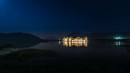 Illuminated night view of Jal Mahal 'Water Palace' is an architectural showcase of Rajput style in the Man Sagar lake in jaipur city, the capital of Rajasthan, India.のeditorial素材