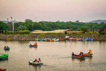 CHANDIGARH, INDIA - MARCH, 2017: Sukhna Lake in Chandigarh, India, is a reservoir at the foothills of the Himalayas, the Shivalik hills. It is a primary tourist attraction in north India.のeditorial素材