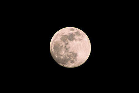 A supermoon is a full moon that nearly coincides with perigee, the closest that the Moon comes to the Earth in its elliptic orbit resulting in a slightly larger-than-usual apparent size of lunar disk.の写真素材