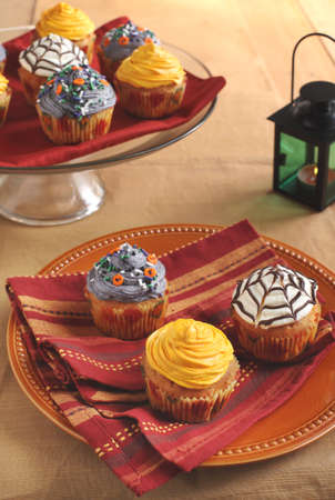 Homemade Halloween pumpkin cupcakes の写真素材