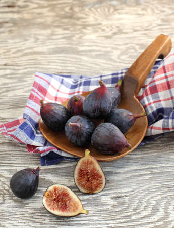 Fresh figs on the wooden tableの写真素材