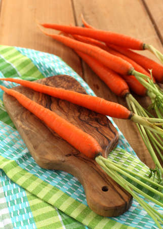 Fresh carrots on the table の写真素材