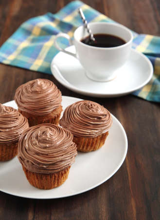 Chocolate cupcake and cup of coffeeの写真素材