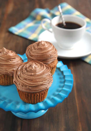 Chocolate cupcake and cup of coffeeの写真素材