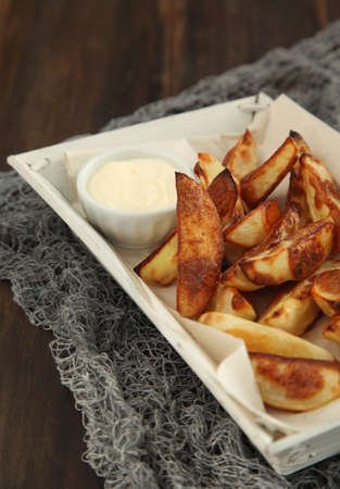 Hand-cut potato chips with aioliの写真素材