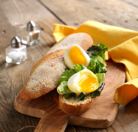 Soft-Boiled Egg sandwich with Green Salad and Mayonnaiseの写真素材