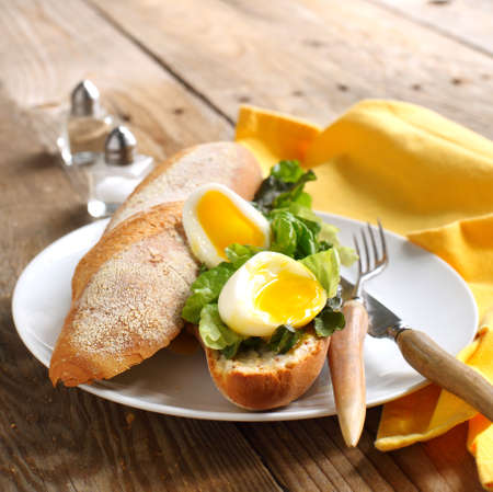Soft-Boiled Egg sandwich with Green Salad and Mayonnaiseの写真素材