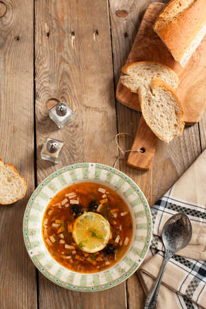 Solyanka, Russian soup with meat, sausage, olives and pickles