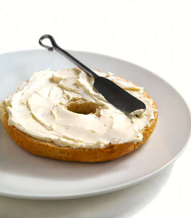 Freshly Baked Bagel with Cream Cheese for Breakfastの写真素材