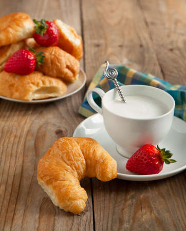 Breakfast with coffee and fresh croissantsの写真素材