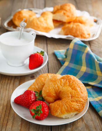 Breakfast with coffee and fresh croissantsの写真素材