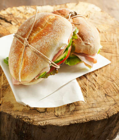Sandwiches with mortadella and vegetablesの写真素材
