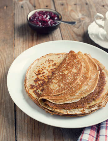 Crepes with black currant jamの写真素材
