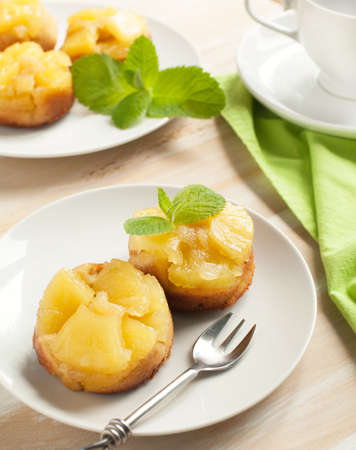 Individual pineapple upside-down cakesの写真素材