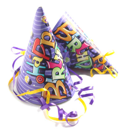 A colorful party hats isolated on white backgroundの写真素材