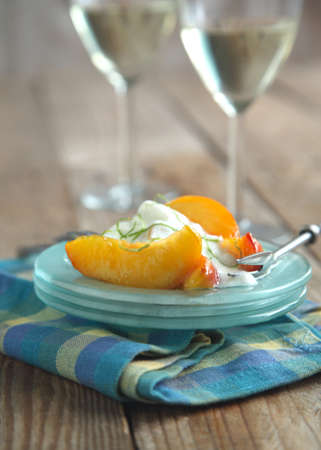 Caramelized Peaches with lime yogurt cremeの写真素材