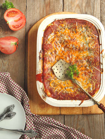 Italian meat lasagna in baking dishの写真素材