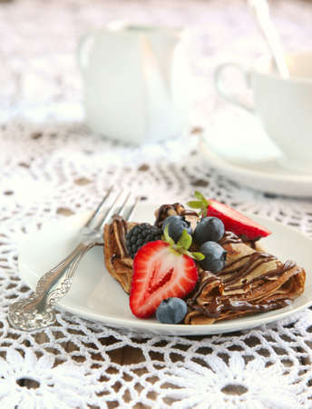 Chocolate crepes with fresh berriesの写真素材