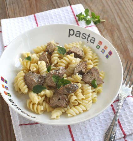 Pasta  Fusilli pasta with chicken liver, oregano and parmesan cheeseの写真素材