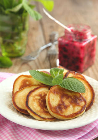 Pancakes with black currant jamの写真素材