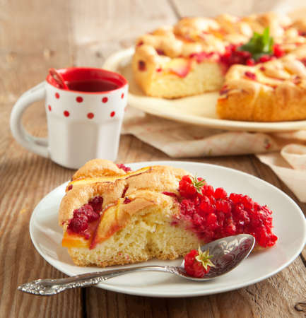Peach and raspberry cakeの写真素材