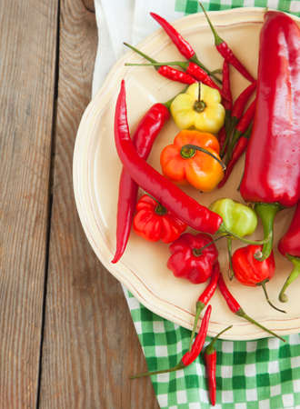 Colored sweet peppers and hot chili peppersの写真素材