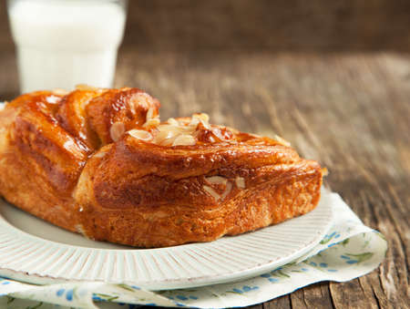 Almond Danish pastry on plateの写真素材