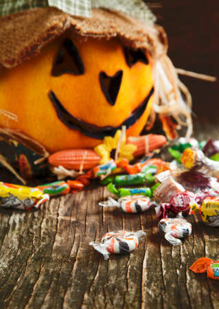 Colorful Halloween candy and Jack-o-lanternの写真素材