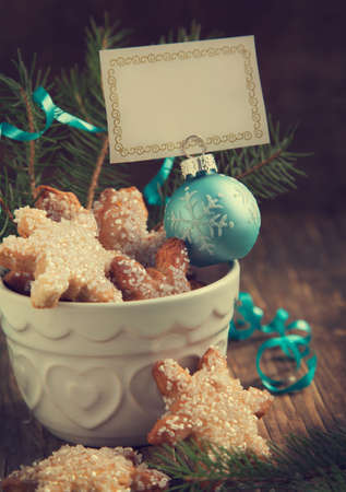 Christmas sugar cookies with empty greeting card  Selective focusの写真素材