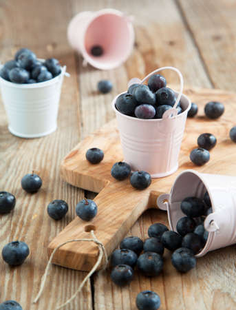 Fresh blueberries in small bucket  Selective focusの写真素材