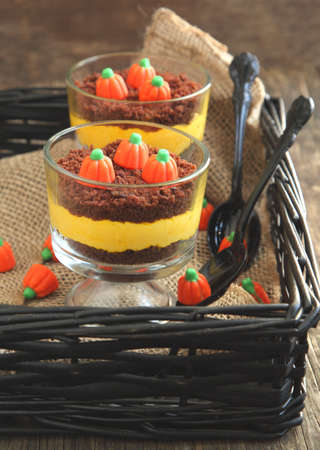 Layered cream cheese and brownie dessert for Halloweenの写真素材
