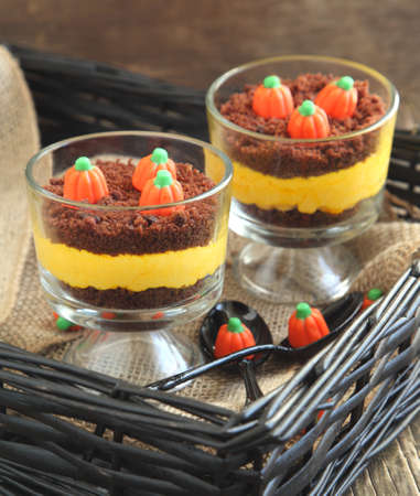 Layered cream cheese and brownie dessert for Halloweenの写真素材