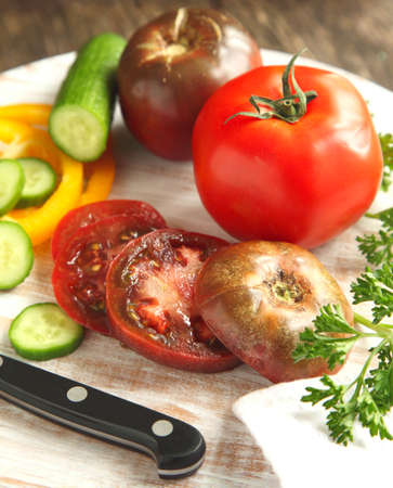 Fresh vegetables on chopping boardの写真素材