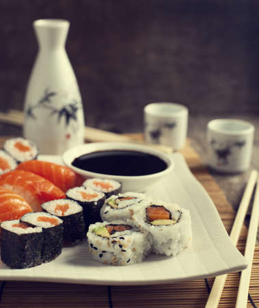 Fresh sushi and rolls on the plateの写真素材