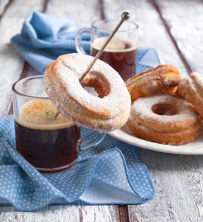 Cup of coffee and donutsの写真素材