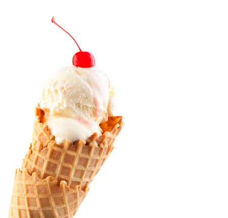 Ice cream cone with maraschino cherry isolated on white backgroundの写真素材