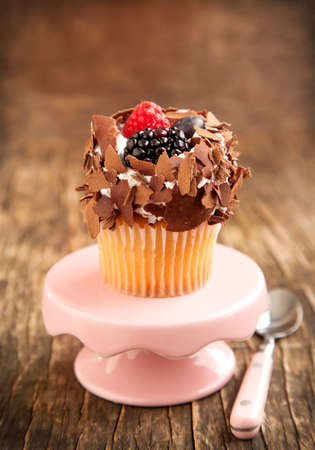  Chocolate and berry cupcakeの写真素材