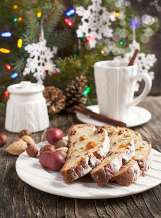 Cup of tea and pieces of Christmas stollenの写真素材