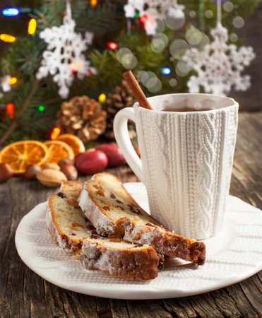 Cup of tea and pieces of Christmas stollenの写真素材