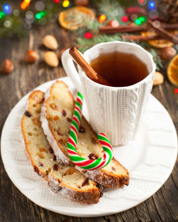 Cup of tea and pieces of Christmas stollenの写真素材