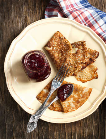 Crepes with raspberry jamの写真素材