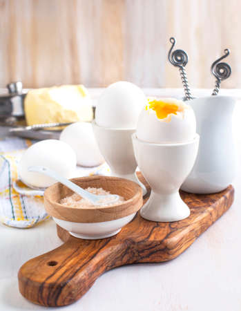 Boiled egg with pink salt for breakfastの写真素材