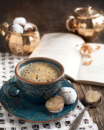 Cup of coffee and white chocolate cake pops の写真素材