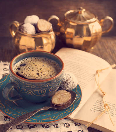 Cup of coffee and white chocolate cake pops の写真素材